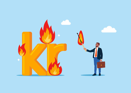 Hot offer. Businessman deliberately sets fire to Sweden currency Swedish krona symbol. Lose money dollar investment in financial crisis, profit and loss in business or deflation and inflation concept.