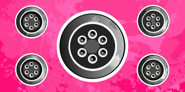Arrangement of circular objects with multiple holes on a pink background