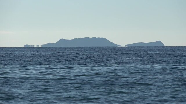 Kas, Turkey - 14 of February 2026: 4K Fata Morgana superior mirage of islands over the sea horizon
