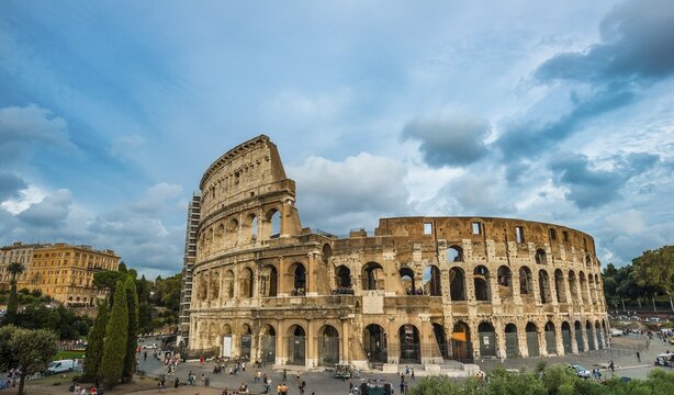 Amphitheater Colosseum with dramatic clouds, Rome, Lazio, Italy