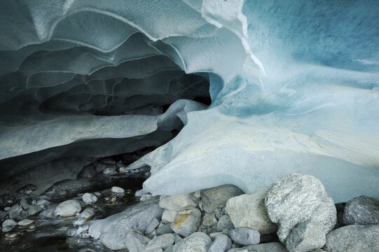 Natural ice cave in the Zinal Glacier, Zinal, Valais, Switzerland, Europe