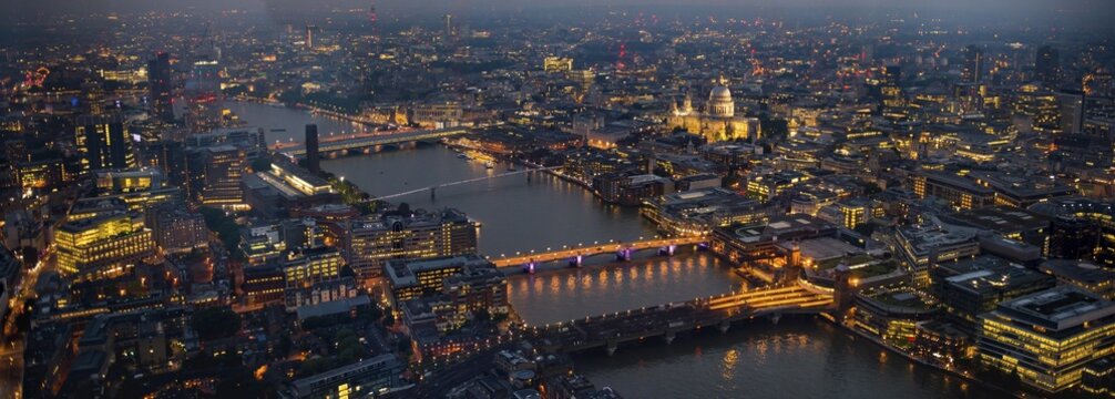 View of River Thames with London Bridge, Millenium Bridge and St. Paul's Cathedral, dusk, aerial view, London, England, United Kingdom