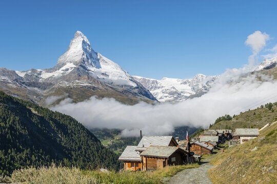 Snow-covered Matterhorn, Old wooden houses, mountain village Eggen, Valais, Switzerland