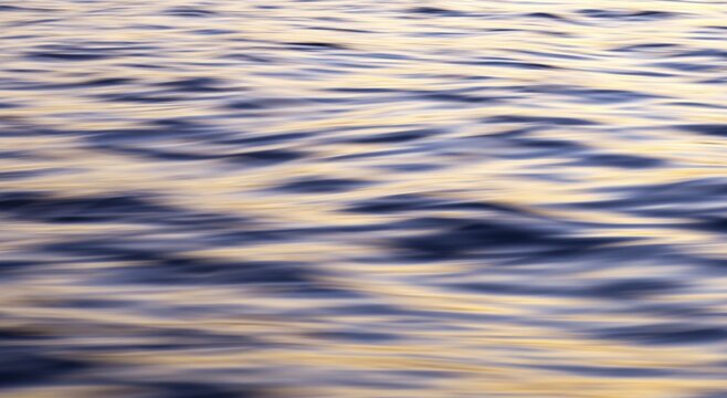 Ocean at sunrise, ocean surface, time exposure