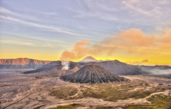 Sunset, smoking volcano Gunung Bromo, Mount Batok in front, Mount Kursi at back, Mount Gunung Semeru, Bromo Tengger Semeru National Park, Java, Indonesia