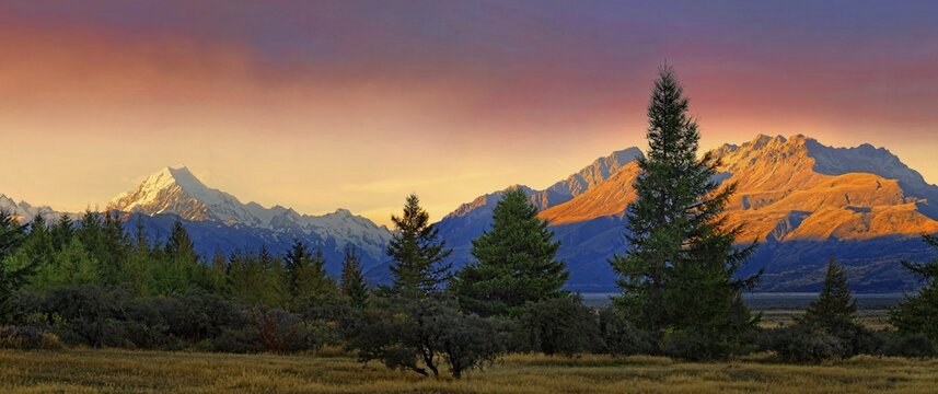 snowy peak of Mount Cook, Aoraki and bush landscape at sunset, Mount Cook National Park, Southern Alps, South Island, New Zealand