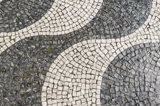 Wavy pattern in pavement, black and white, cobblestones, Rossio, Lisbon, Portugal