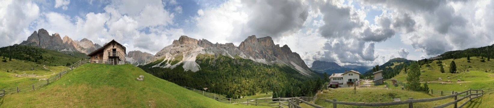 360&deg; panorama with bizarre cloudy sky near the Regensburg Hut on the Seceda High Plateau with a view towards the Geisler and Stevia mountains, Puez-Geisler National Park, Wolkenstein, Alto Adige, Italy, Europe