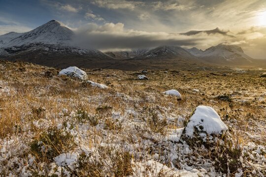 Snowy mountain tops of Ben Lee with clouds in Highland landscape, Sligachan, Portree, Isle of Sky, Scotland, United Kingdom