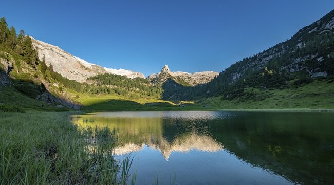 Schottmalhorn reflected in lake Funtensee at sunset, Steinernes Meer, Berchtesgaden National Park, Bavaria, Germany