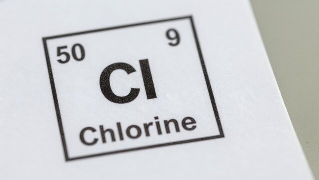 Close up of white paper showing periodic table element square with Chl.