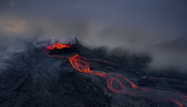 Aerial view, erupting volcano with lava fountains and lava field, crater with erupting lava and lava flow, Fagradalsfjall, Reykjanes Peninsula, Iceland