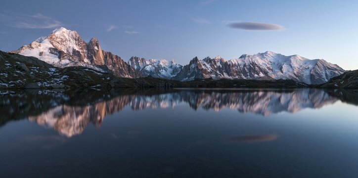 Mont Blanc massif reflected in the Lac de Chesery, left Aiguilles de Chamonix, Mont Blanc right, Chamonix, France