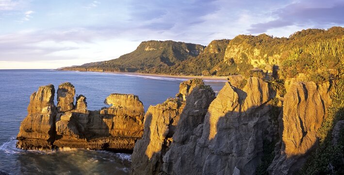 Pancake rocks at the coast at sunset, Punakaiki National park, South Island, New Zealand