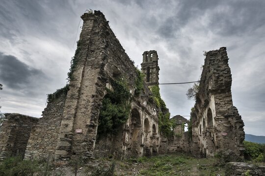 Former Franciscan convent of Orezza, ruins of the destroyed church in front of cloudy sky, Valle-di-Rostino, Haute-Corse, Corsica, France