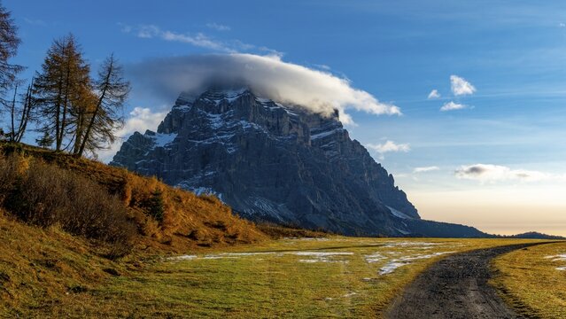Peak of Monte Pelmo in the morning light with autumn landscape, Colle Santa Lucia, Val Fiorentina, Dolomites Italy