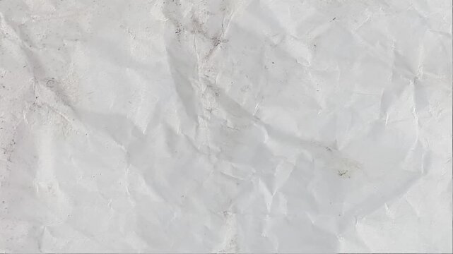 Crinkled wrinkled paper texture animation, white crumpled paper background stop motion effect