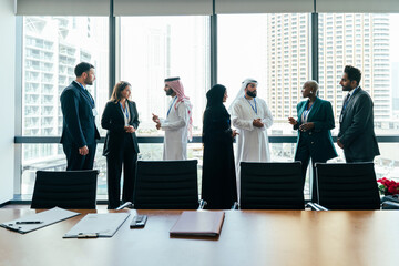 Multiethnic business team networking during corporate meeting in dubai