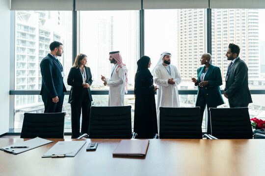 Multiethnic business team networking during corporate meeting in dubai