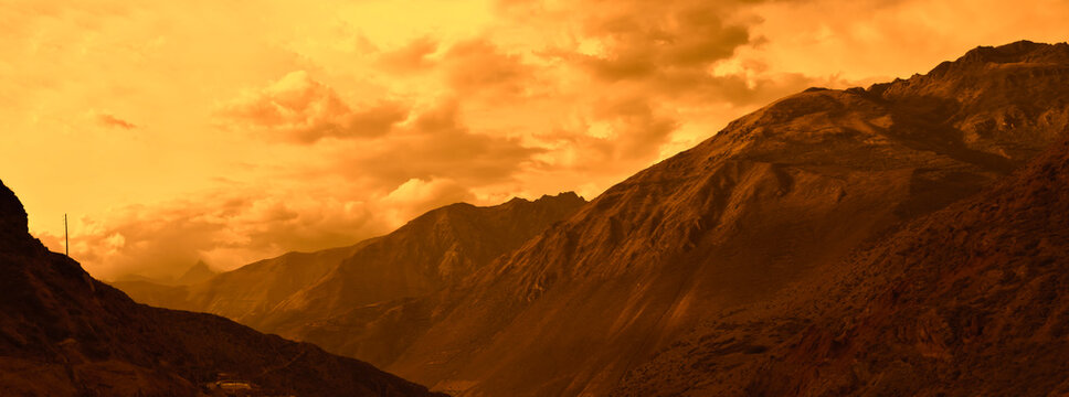 Fantasy yellow effect color of mountain around Las Salineras de Maras, en el Valle Sagrado del Cusco