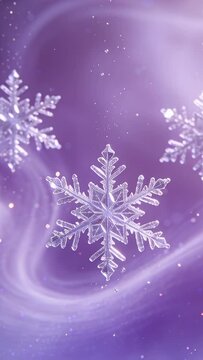 Vertical video: Rotating snowflake showing facets on play in purple studio flanked by side flakes