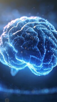 Vertical video: Rotating 3D brain showing activity via particles in blue void rim light sparking