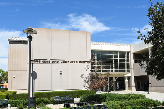 SANTA ANA, CALIFORNIA - 22 MAR 2026: Covered up sign at the former Cesar Chavez Business and Computer Center at Santa Ana College, amid the current controversy and scandal.