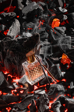 Intense incense perfume in unusual environment of smoke and wood.