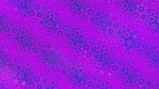 Gold yellow geometric animation with diagonal density transition from small dots and hexagons to large glowing structures creating depth for luxury branding and digital backgrounds seamless loop