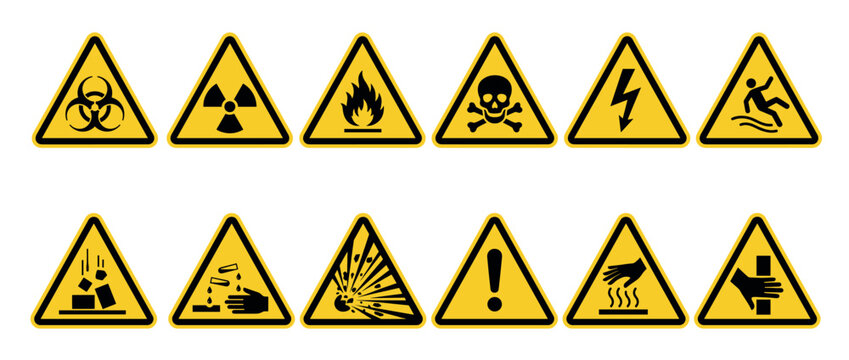 Collection of yellow triangular warning signs with various hazard symbols for safety, danger, and caution alerts in industrial and public settings.