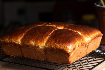 Freshly baked bread cooling on a wire rack