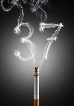 Cigarette smoking artfully forming number in gray composition