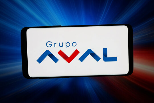Stuttgart, Germany - 03-18-2026: In this photo illustration, the logo of company Grupo Aval Acciones y Valores S.A. is displayed on a smartphone in front of abstract background on computer screen.