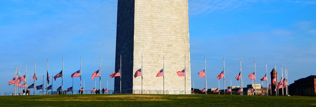Washington Monument in DC Tall Reaching Up to blue Sky with Amer