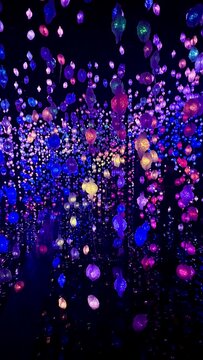 Colorful immersive light installation in dark exhibition space