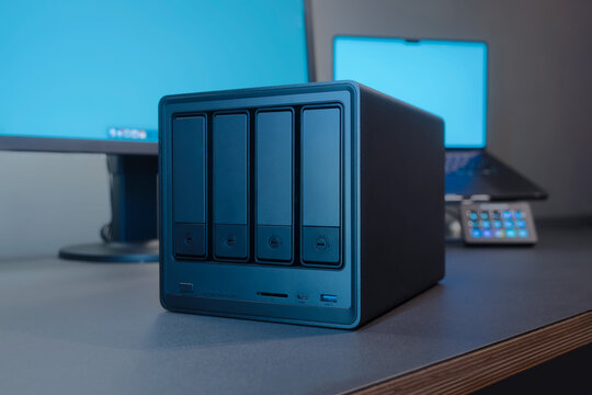 Network NAS Desktop Server With Five Drive Bays On Modern Office Desk Setup