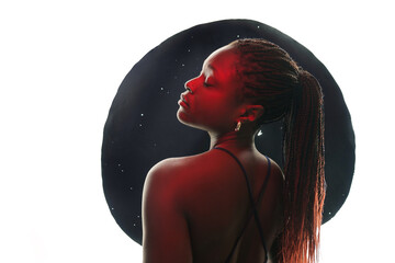 Portrait of authentic young african girl in red and blue neon light in the studio