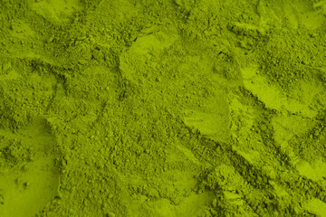 Matcha tea, matcha powder as a background. © Nikolay