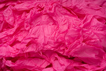 Obraz premium Pink and blue latex sterile medical gloves as a background.