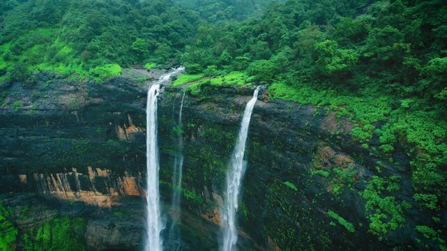 4K Drone shot of Beautiful Kataldhaar waterfall falling from cliff near Lonavala, Maharashtra, India. Monsoon waterfall in Sahyadri hills. Nature landscape. Travel background.