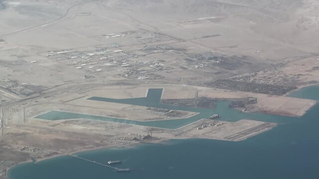 4k aerial video footage of area around Ain Sokhna Port, a multi purpose hub port, situated in Ain Sokhna, Red Sea coastline, in the Suez Governorate of Egypt 