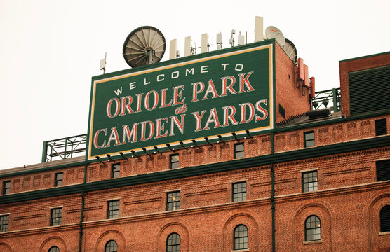 Welcome to Oriole Park at Camden Yards sign on top of a brick building in Baltimore, Maryland, USA December 28, 2024