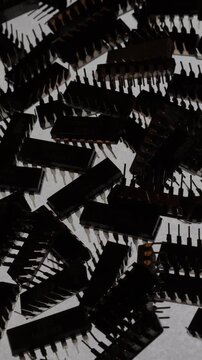 Vertical 916 Macro ECU of TTL integrated circuits rotating on turntable, top view, Misty Low keylight, cold backlight