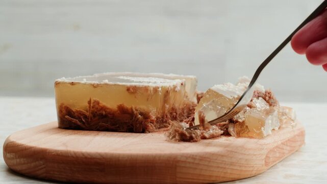 Meat aspic, slavic food, Traditional Russian pork meat aspic Kholodets with horseradish, mustard, jellied jelly beef, eating in restaurant chicken tasty dish. Close up on kitchen. 