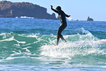 Lone surfer in the ocean near Esmelle beach, Ferrol, Spain . January 22 , 2026 © GenadiyGM