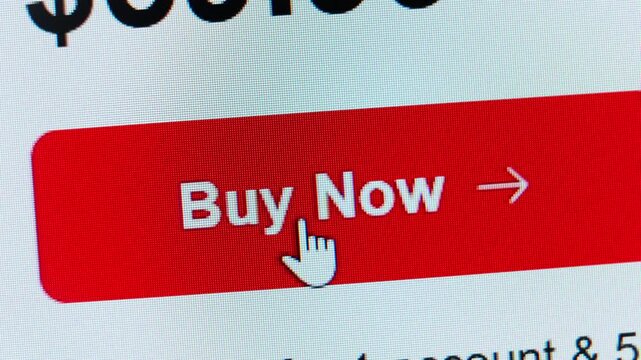 Macro Stop Motion of Online Shopping. Hand Pointing at Buy Now Button
