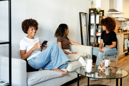 Friends enjoying time together in a cozy living room