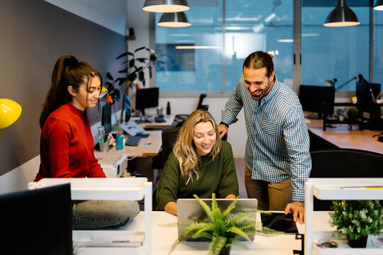 Collaboration in modern office coworking space