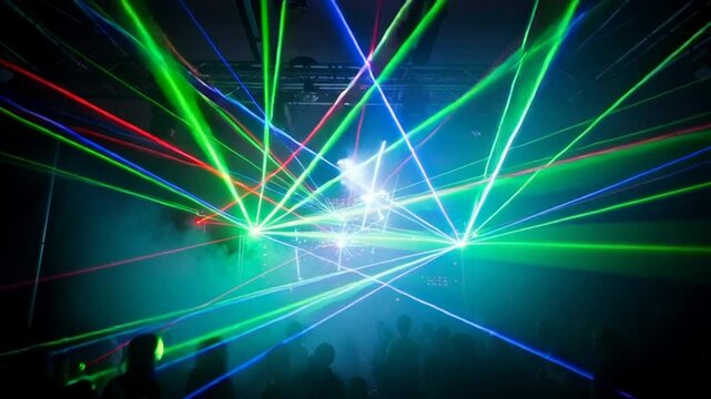 vibrant laser light beams in dark concert stage with smoke effect