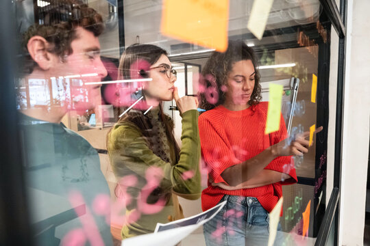 Multiethnic team collaborating in a modern coworking space